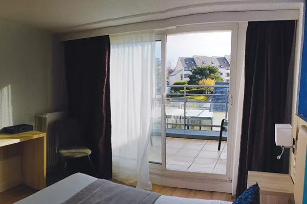 Double confort avec balcon lit d'appoint